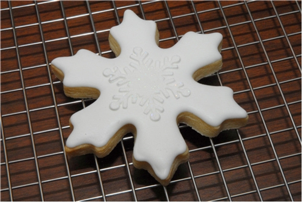 Decorated snowflake cookies using Holiday Cupcake and Cookie Stencil
