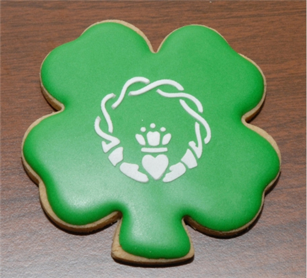 Shamrock Cookie iced and stenciled using St. Patrick's Day Round Cookie Stencil Set by Designer Stencils