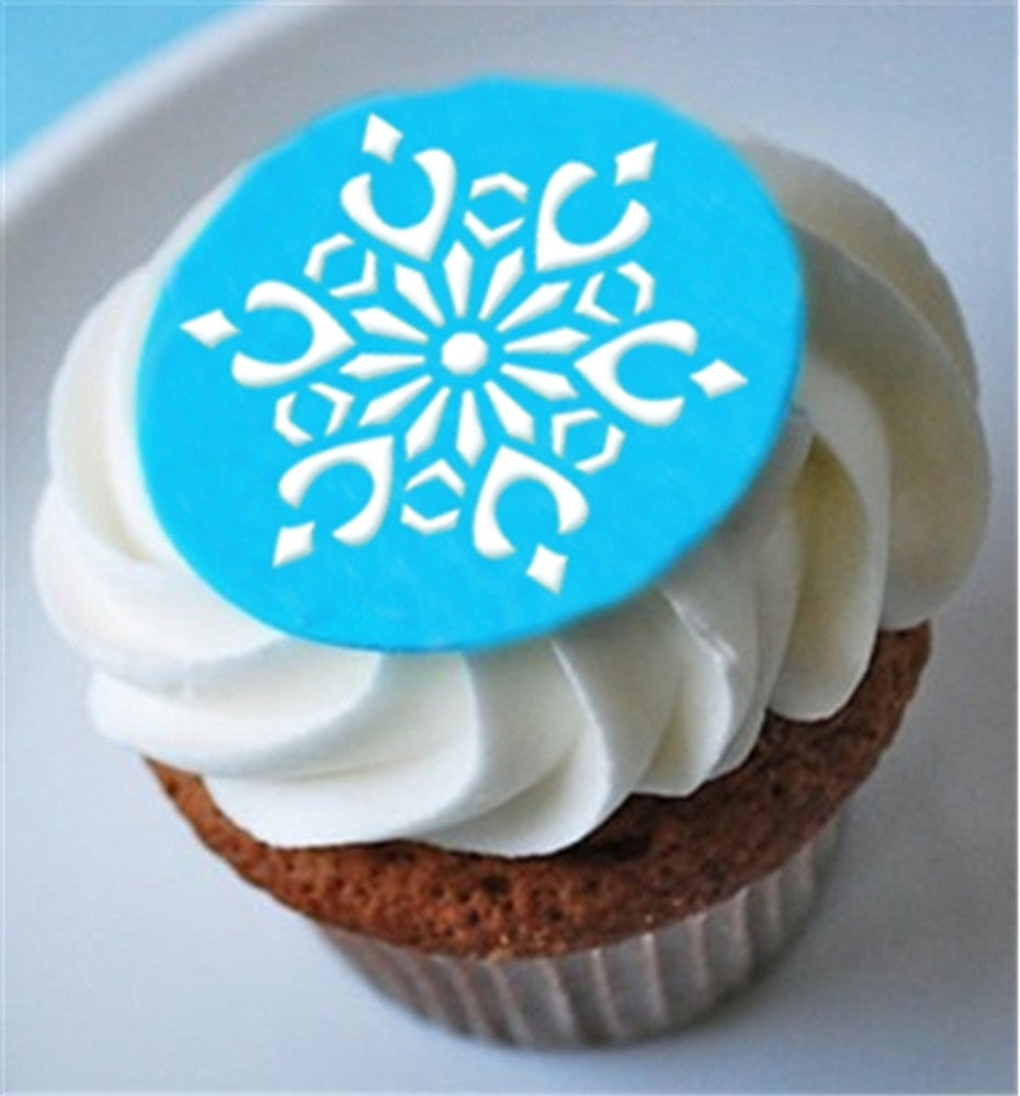 cupcake topped with a snowflake using Snowflake cupcake stencils