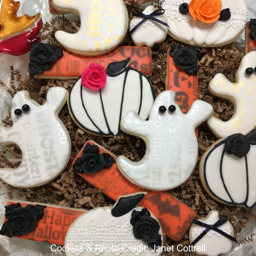 Halloween cookeis decorated by Janet Cottrell using Confection Couture's Halloween Cookie Stencils