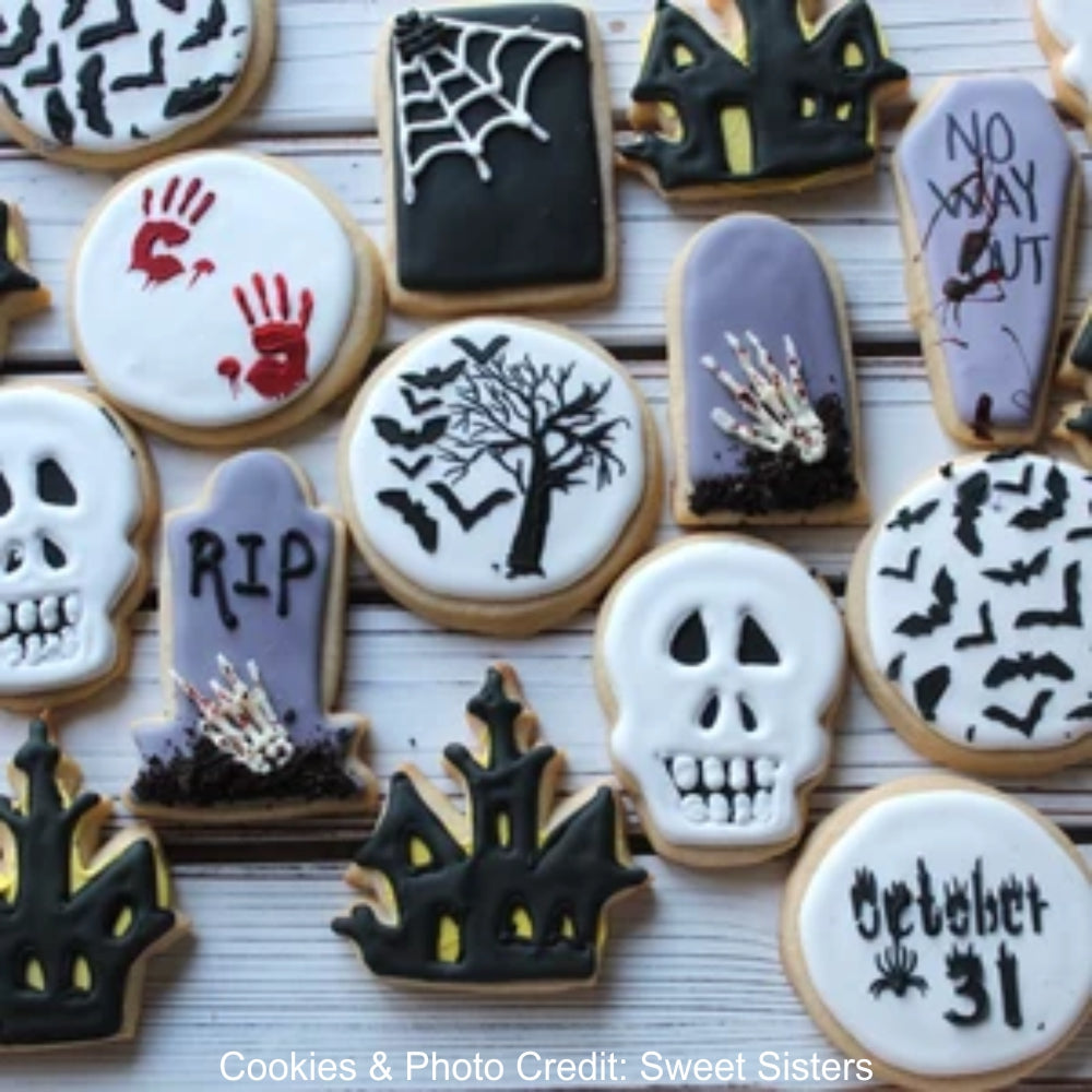 Halloween Cookie Stencils iced onto cookies using royal icing