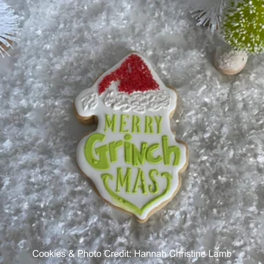 GRINCH COOKIES  BY HANNAH LAMB USING ROYAL ICING AND MERRY GRINCH MAS COOKIE STENCIL