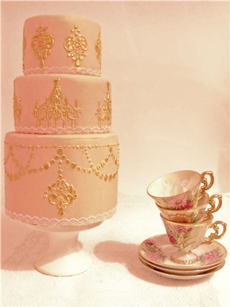 Tea Party themed tiered cake using Chandelier Cake Stencil Side Set by Designer Stencils in pink and gold