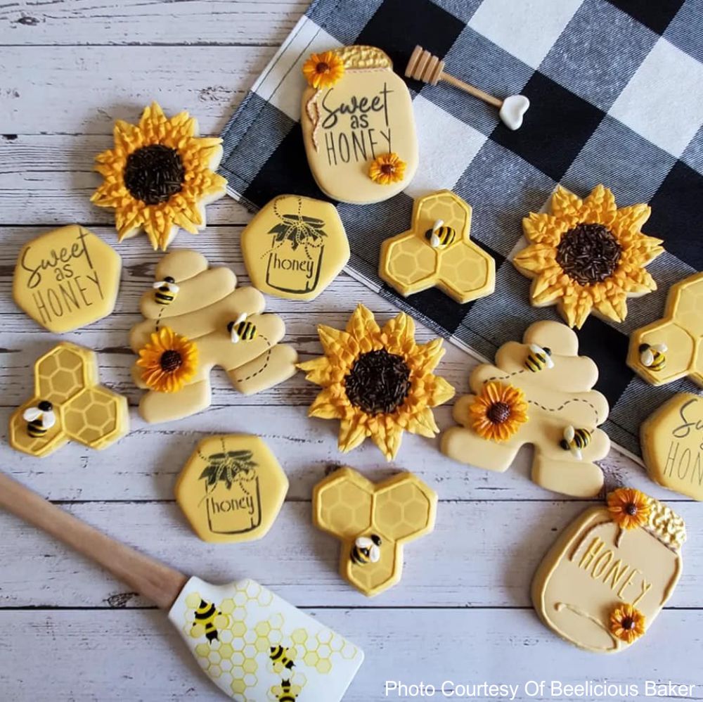Cookies airbrushed with Vintage Honey Bee cookie stencil by Beelicious Baker