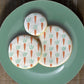 Iced cookies with airbrushed carrot pattern for Easter